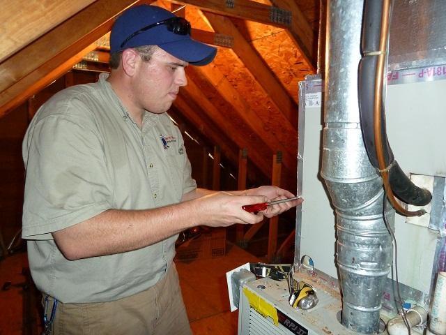 Josh working hard doing a A/c Tune Up