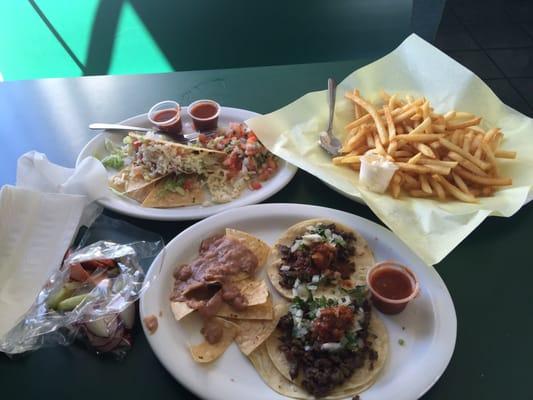 Carne asada tacos , fries and tacos dorados! Very yummy!