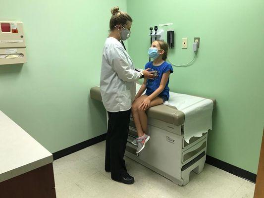 Nurse Charlotte with one our East Cobb Sun Pediatrics patients.