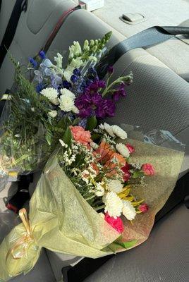 Here are the 2 bouquets I made. I chose the flowers and the lady helping me added greenery and packaged them up so nicely!