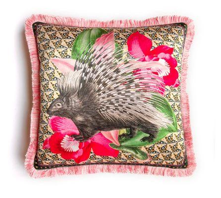 Plush pillow with pink trim and an image of a black and white drawing of a porcupine over colorful flowers