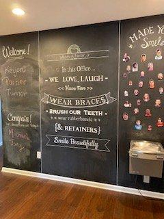 Fun chalkboards and art can be found throughout the office.