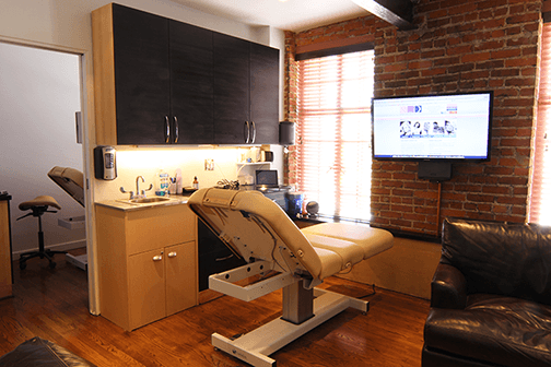 This is the main treatment area. The treatment chair is actually a massage table.