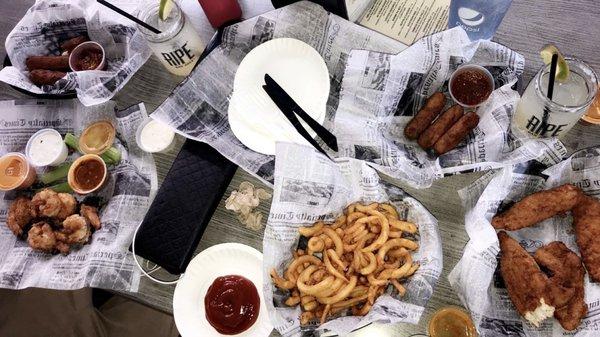 chicken fingers, curly fries, shrimp, mozzarella sticks