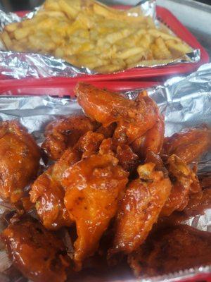 Buffalo wings and cheese fries