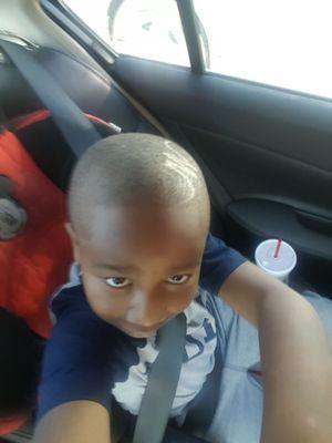 My son's selfie after his cut