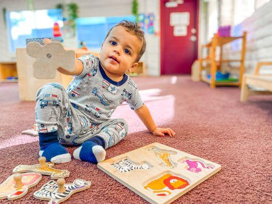 Infant room - he loves this activity!