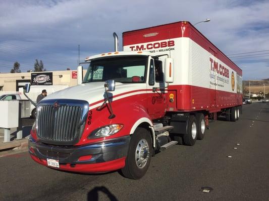 TMCOBB truck outside parked at Clouston Sash and Door everyday.