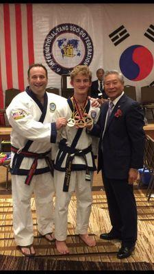 Master Derek with his son and Grandmaster CS Kim