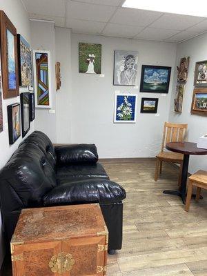 Back room seating area - love the couch and the art on the walls.