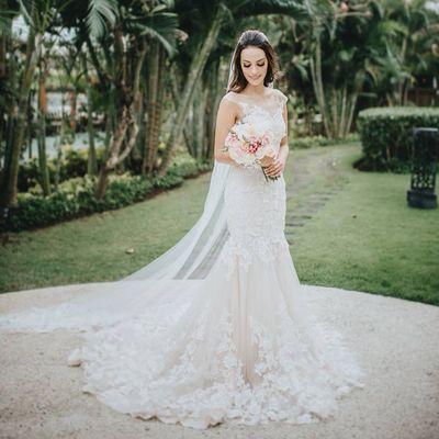 Rose-colored couture wedding gown complete with a long train by Zakaa.