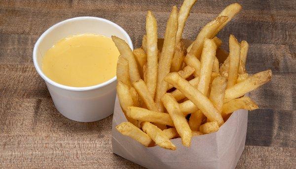 CHEESE FRIES - served with our hausmade cheese sauce