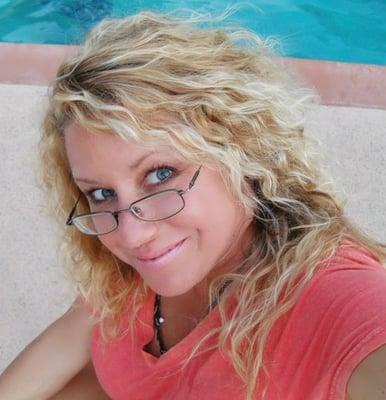 This hairstyle was done by Lindsey on me in the Summer 2011!  Triple blond highlights  and my hair is naturally curly.