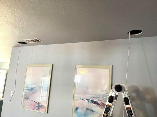 Installing in-ceiling speakers for surround sound. Optimize your movie & music experience.