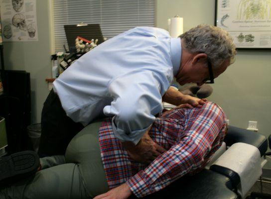 Dr. Simon performing an adjustment.