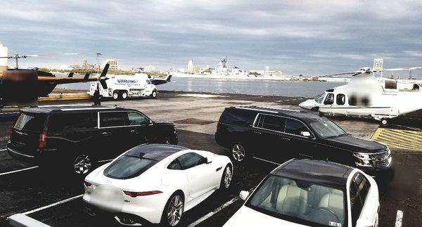 Heliport: Our SUV convoy patiently waiting for client. Visit us Cartierblack.com