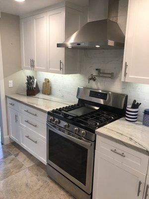 Range with hood and cabinets