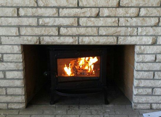 Jotul F100 QT inside of the existing fireplace. Thanks to Aaron, Erin, and Eric for amazing service.