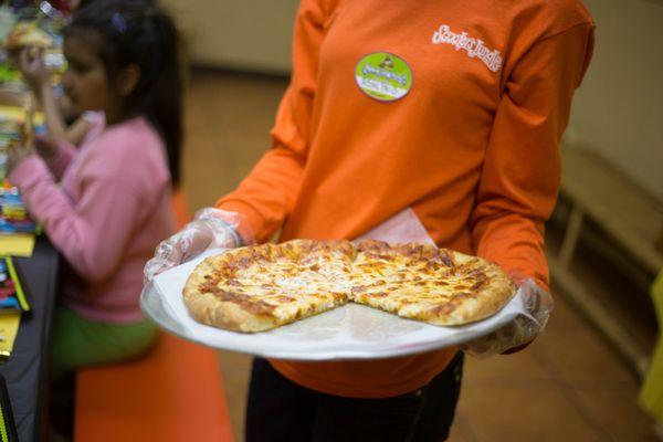 Delicious Pizza from our In-House Kitchen.