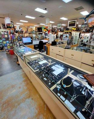 Sept 2021: Pic 9 of 63-- The long checkout counter w/ two modern registers