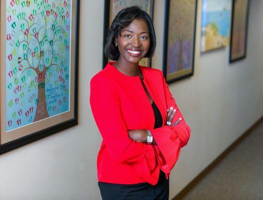 Dr. Gueye in RMA's "Tree of Hope" Hallway