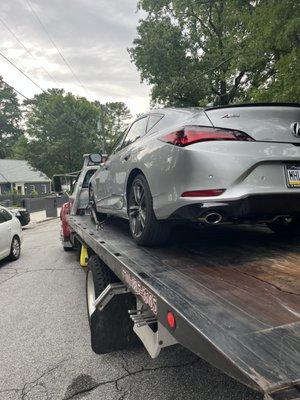 Towing car with  flat tire