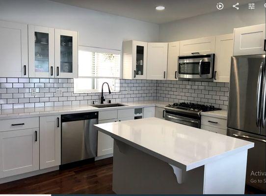 small remodeling of kitchens, installation of a new classic style backsplash, new fully manufactured countertop customized in Cortana quarte