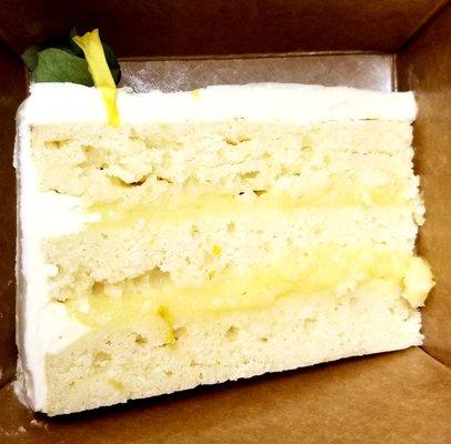 $6.50 Lemon Cake slice: Layered w/tart lemon curd, covered in white chocolate buttercream, so good! Paired w/Earl Grey Tea = Happiness :D