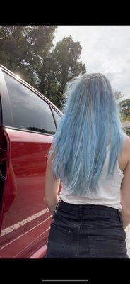 After she fixed it. I honestly don't mind the back, I know the color will fade