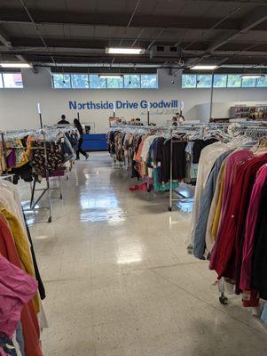 Inside. Northside Drive Goodwill. Clothes and checkout. Facing the front of the store.