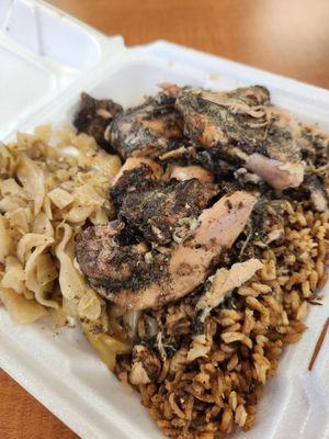 Jerk chicken with rice and beans and cabbage