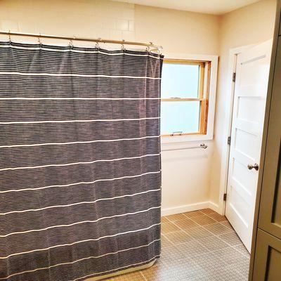 Phinney Ridge Bathroom Remodel. Replaced window with a new Anderson wood clad window.