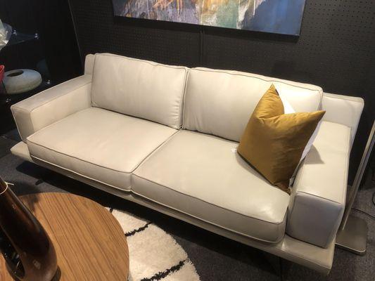 This Beige Sofa is made in Italy, offering a substantial sized seat and armrest for a very comfortable option.