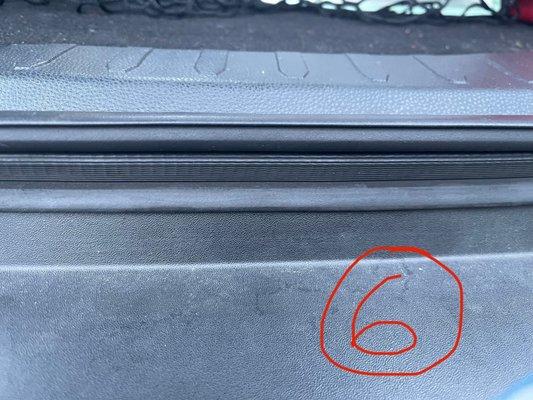 The rubber seal around the trunk was not installed back correctly causing the abnormal opening and closing of the trunk door.