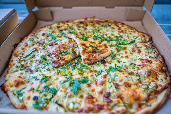 Artichoke, spinach, fresh ricotta, mozzarella, garlic olive oil, organic lemon zest, and Italian parsley