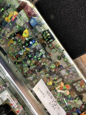 Plenty glass pipes by the front counter area