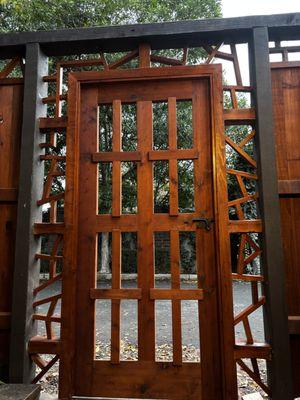 Redwood gate in suspension .