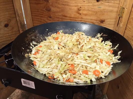 Sautéed cabbage with carrots and potatoes.