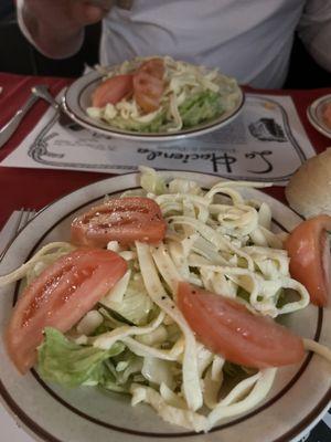 Lettuce and tomato salad with house dressing