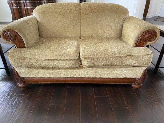 Couch that "needs to be vacuumed and cleaned"