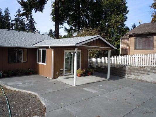 After - New addition w/patio cover, New patio w/drainage and retaining wall.