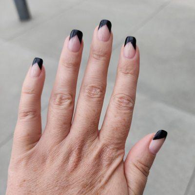 Obsessed with these angular black tips by Travis.