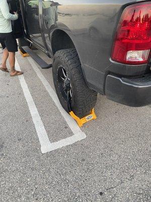 Another booted car at the Rickenbacker Marina despite having a visitor parking pass issued by the Marina.