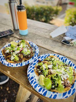 Left taco plate: 2 lengua, 2 al pastor Right taco plate: lengua, cabeza, carnitas, al pastor