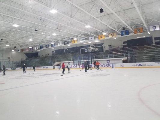 Hockey rink and basketball court share the building. it was about ten degrees in here.