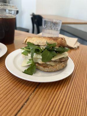 Sausage McVinal with arugula on Multigrain English Muffin