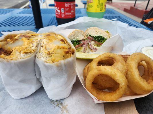 Italian sandwich onion rings and breakfast burrito.