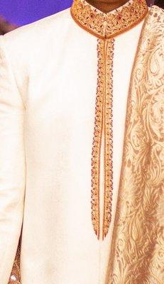 Husband's sherwani - look at that huge gap! Work does not line up. Work is red and gold instead of silver and gold like I had asked.