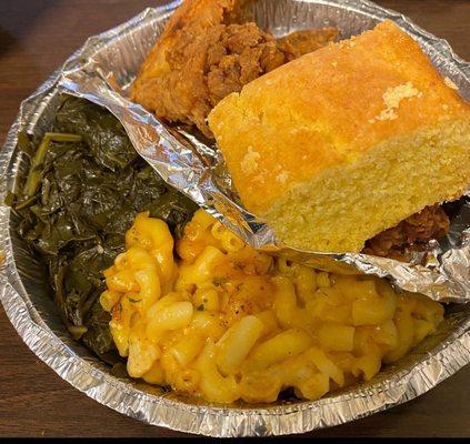 Fried chicken wings,cornbread, Mac & cheese,& collard greens.