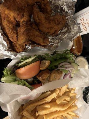 Chicken Finger Mango habanero plate with French fries and house salad. Sauce on the side